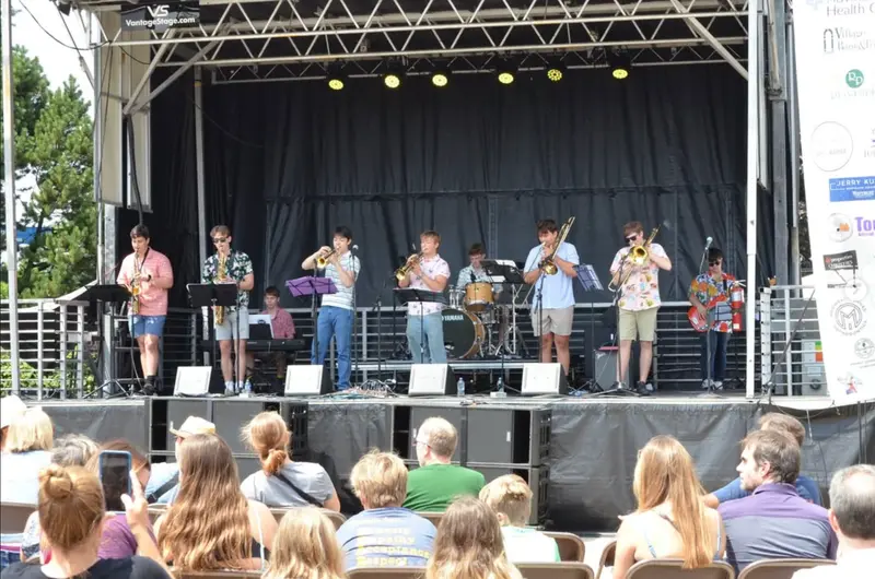 Scholarsjazz performing for an outdoor audience at a Chicago-area summer festival